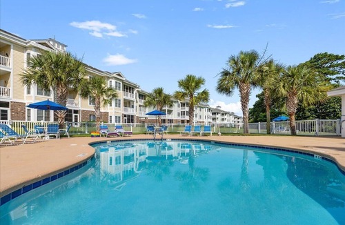 Central Myrtle Beach Condo | Bright & Spacious 2BR with King Bed, Overlooking Pool & Golf Views