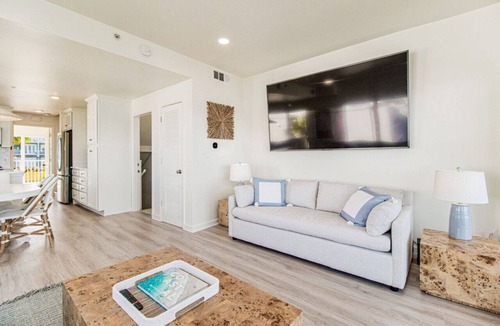 Villa Sabine Townhouses Villa | Fully renovated waterfront townhome with kayak, SUP, bikes, wagon, chairs, tent!