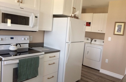 Cheticamp House | Main Floor (Unit 1) in House, Deck, Sunset, Water View (Cheticamp Harbour)