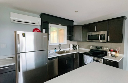 Moncton Villa | Modern Designer Villa Condo in Prime Location with Exclusive Amenities".