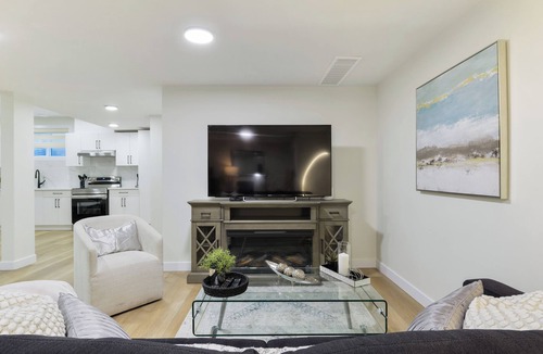 Southeast Edmonton Apartment | Modern & Elegant Executive Suite near Refinery Row. Office Desk + Kitchen