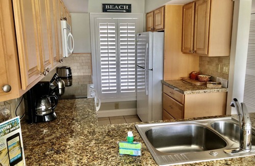 Spinnaker Beachhouses Villa | Pet Friendly! Walk to Pelican Beach, Pools, Golf, Dining! Amenity access included!
