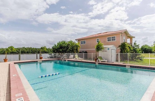 Everglades City Villa | Waterfront Villa With Large Deck And Screened Front Porch Overlooking The Pool