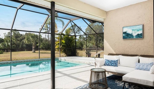 Beautiful Canal Front Home with Pool, Tennis Court in Naples