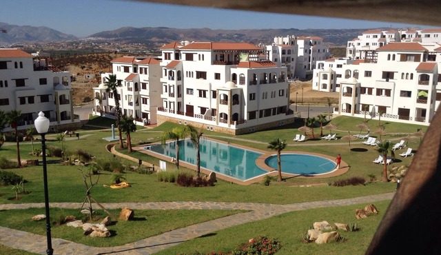 Bright charming apartment -Lilac's Garden, sea, mountain and pool views in Cabo negro