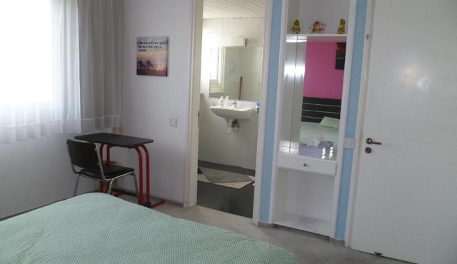 Double room with ensuite bathroom at Datacom building