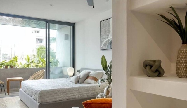 Featured on Forbes Magazine King Bed | Luxe Studio in Playa del Carmen