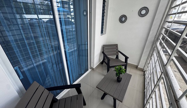 First floor 2-bedroom apartment with AC in vibrant Moca