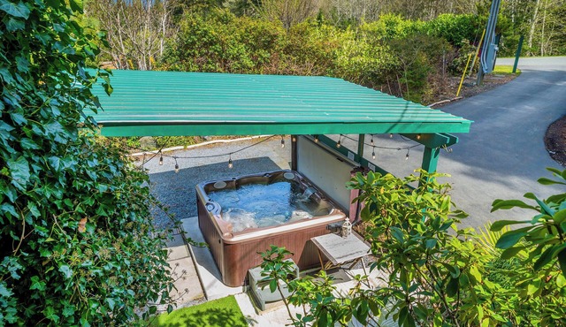 Koi Pond & Meditation Gardens Await In The Quiet Rainforest of East Sooke in Sooke