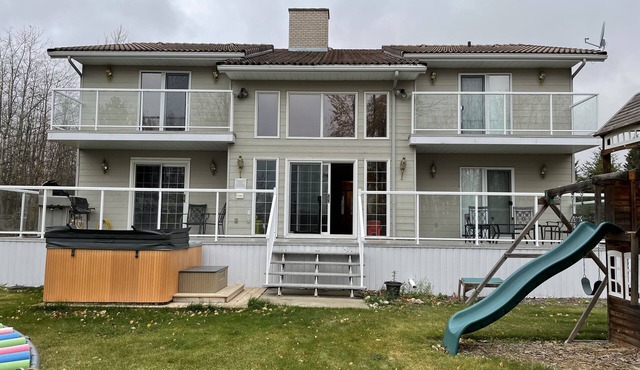 Large family or group vacation lake home with dock and boats 35 minutes from WEM in Sherwood Park