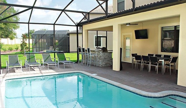 Luxury 5 bed; outside BBQ/TV area with South facing pool in Championsgate
