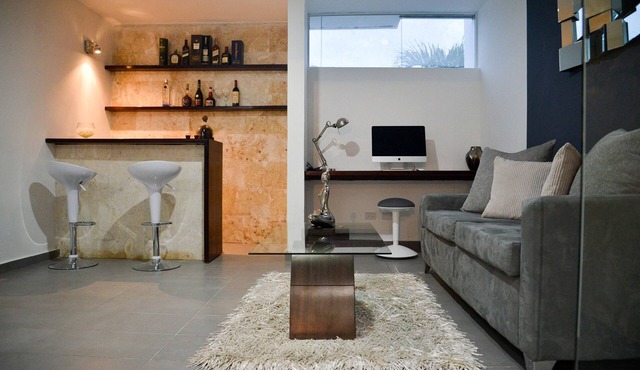 Luxury guest-friendly room in central Sosua, private bar, adults only in Sosúa