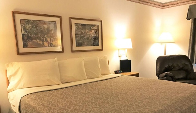 Non-smoking Single King Executive at FairBridge Inn & Suites Thorp in Thorp