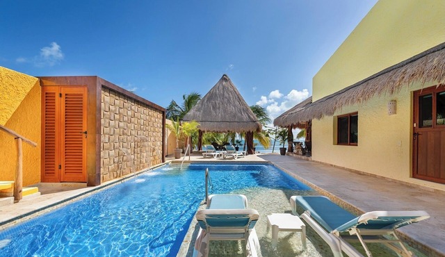 Oceanfront Villa w/Private Beach, Dock, Heated Pool & Sunset Views in Sac Bajo