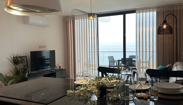 Penthouse on the waterfront with beautiful sea and mountain views. Deja Blue Wellness Resort