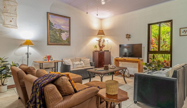 Relaxed tropical home with private pool, lush gardens & family-friendly layout
