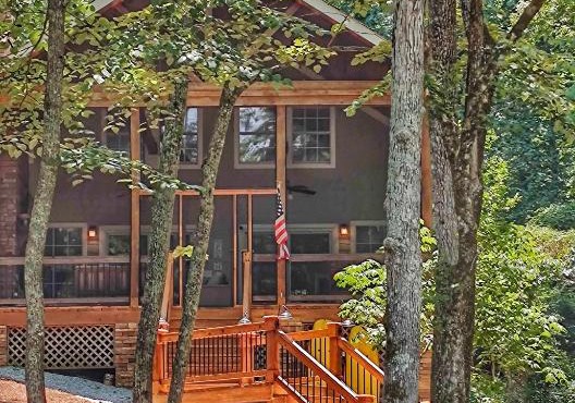 Spectacular porch on Lake Oconee, just a few steps from the water