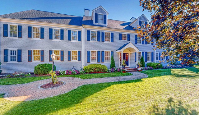 Sprawling dog-friendly lake estate with pool, patio, fire pit, games, & views