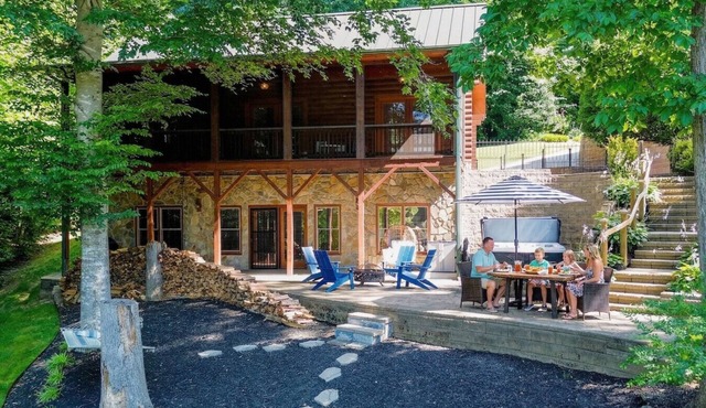 Waterfront Log Cabin w/Hot Tub, Kayaks, Firepit, King Beds, & Pets OK