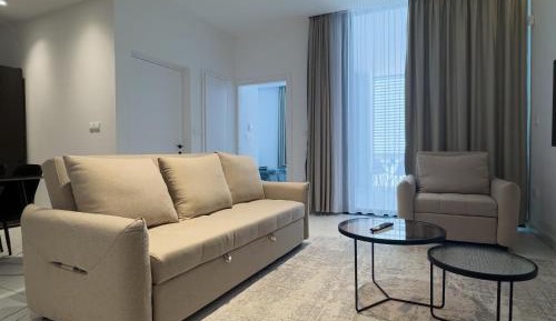 One-Bedroom Apartment with Balcony and Sea View