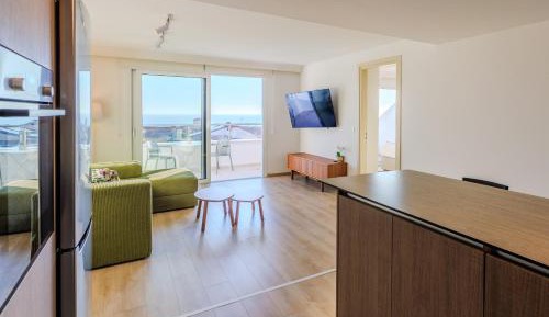 One-Bedroom Apartment with Balcony and Sea View