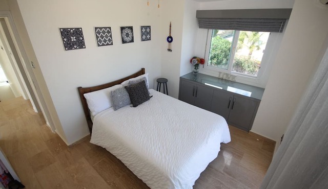 Kick back and relax in this calm, stylish space. New for Summer 2024.